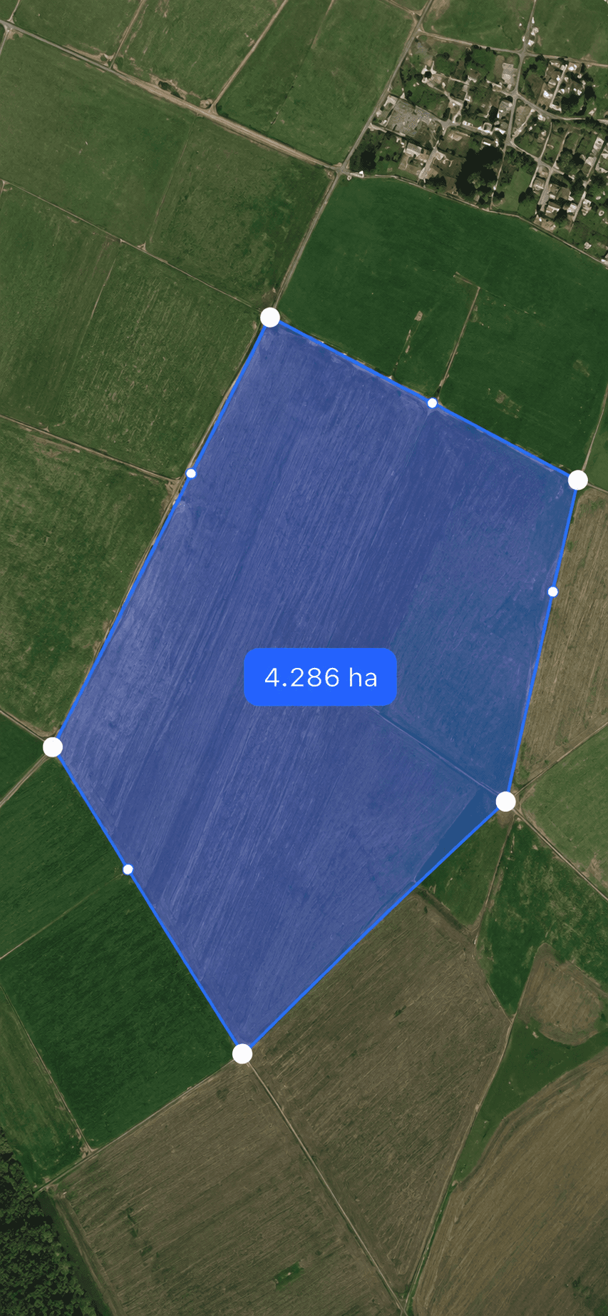 Satellite map view of a measured field with a 4.286 hectare boundary